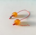 Greek begleri orange trasparent oval barrel shape